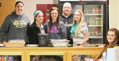 Image: Italy Softball serves up grill cheese sandwiches and chicken tortilla soup for extra funds while working the concession stand during the boys basketball games. Jaclynn Lewis, Cassidy Childers, Bailey Eubank, Coach Michael Chambers, Britney Chambers and Lillie Perry knock this idea out of the park with help from Chef Coaches Wayne Rowe and Johnny Jones.