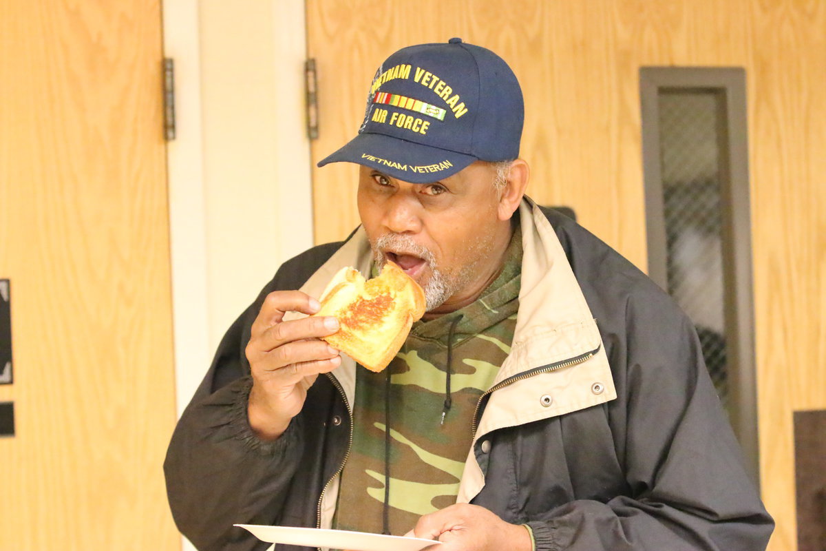 Image: Billy Ray Turner says, “Cheese!” Well, he eats a grilled cheese sandwich anyway in support of the Italy Softball program. That is some sacrifice.