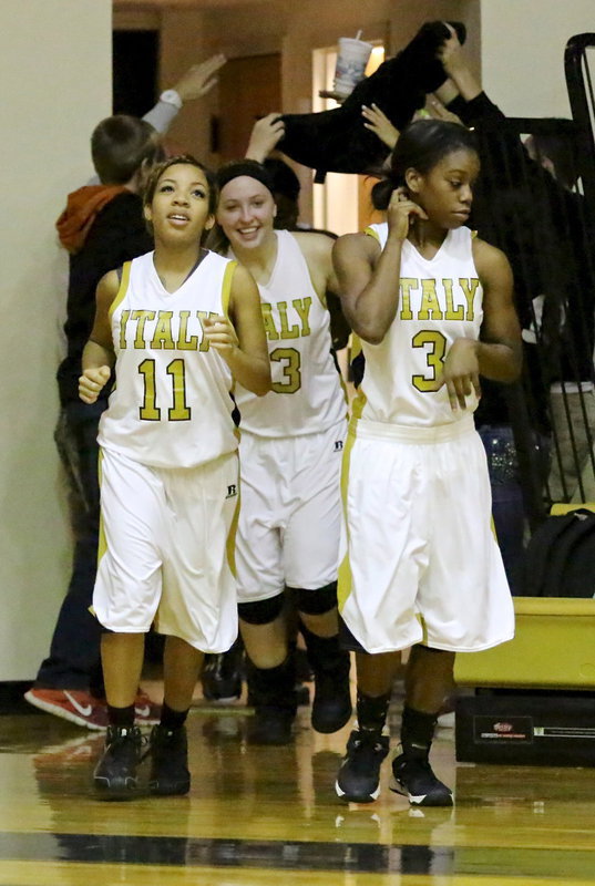 Image: Ryisha Copeland(11), Jaclynn Lewis(13), Kortnei Johnson(3) and their teammates get support from fans Levi McBride, Clayton Miller, Ashlyn Jacinto and Jack Hernandez as they return to the court for the second-half. In that moment, 4 fans equalled 4,000!