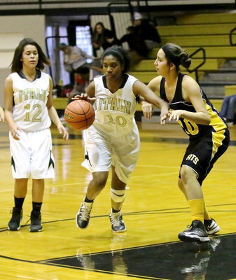 Image: Janae Robertson(10) drives into the heart of Itasca’s defense.