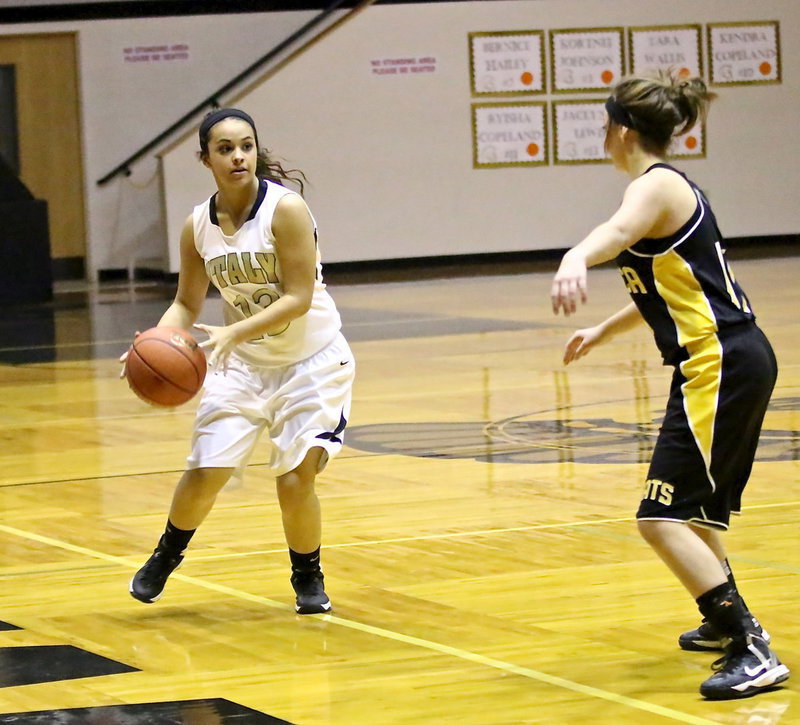 Image: Ashlyn Jacinto(13) prepares to pass the ball.