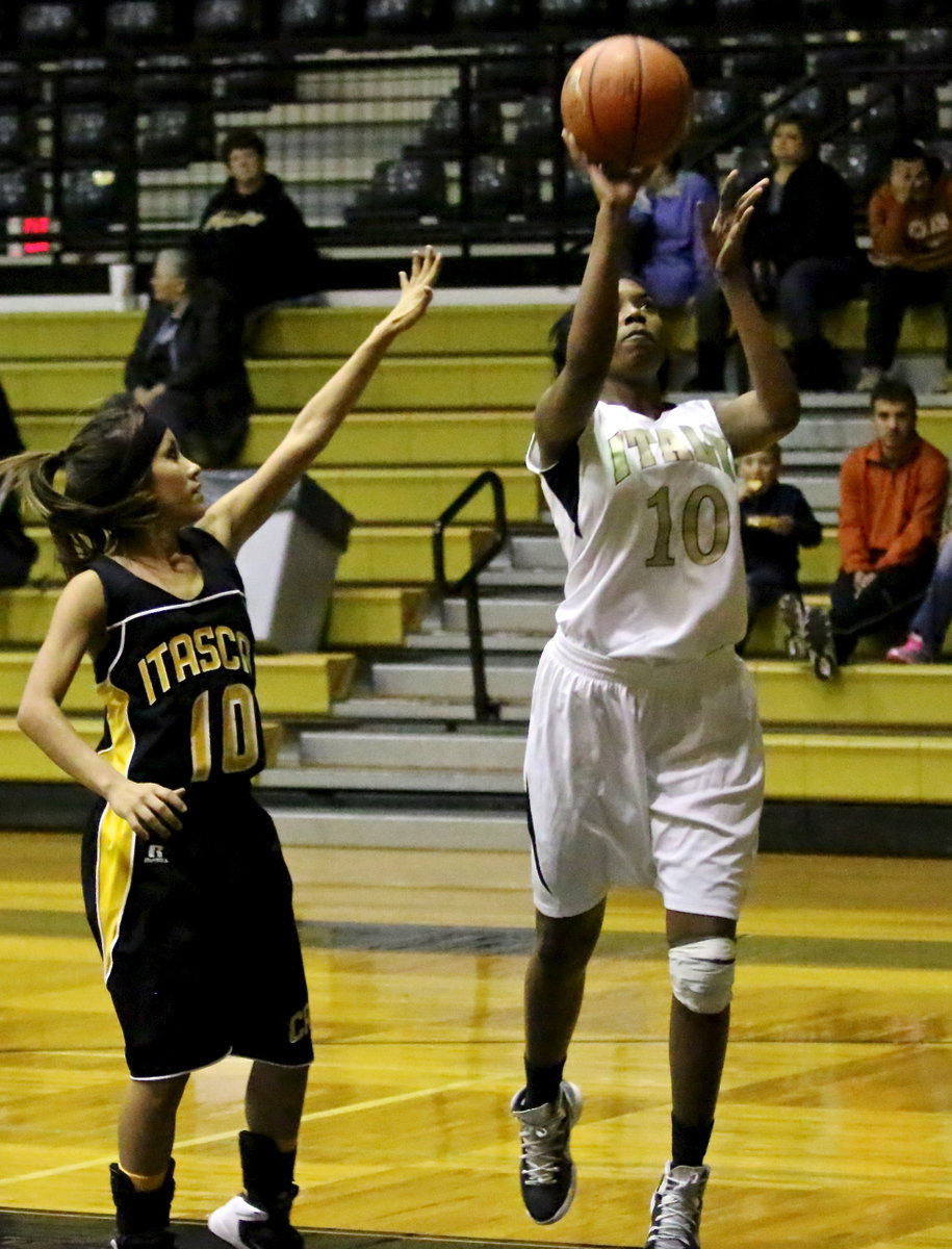 Image: Janae Robertson(10) finishes a fast break basket for 2-points to help seal the win for Italy’s JV girls.