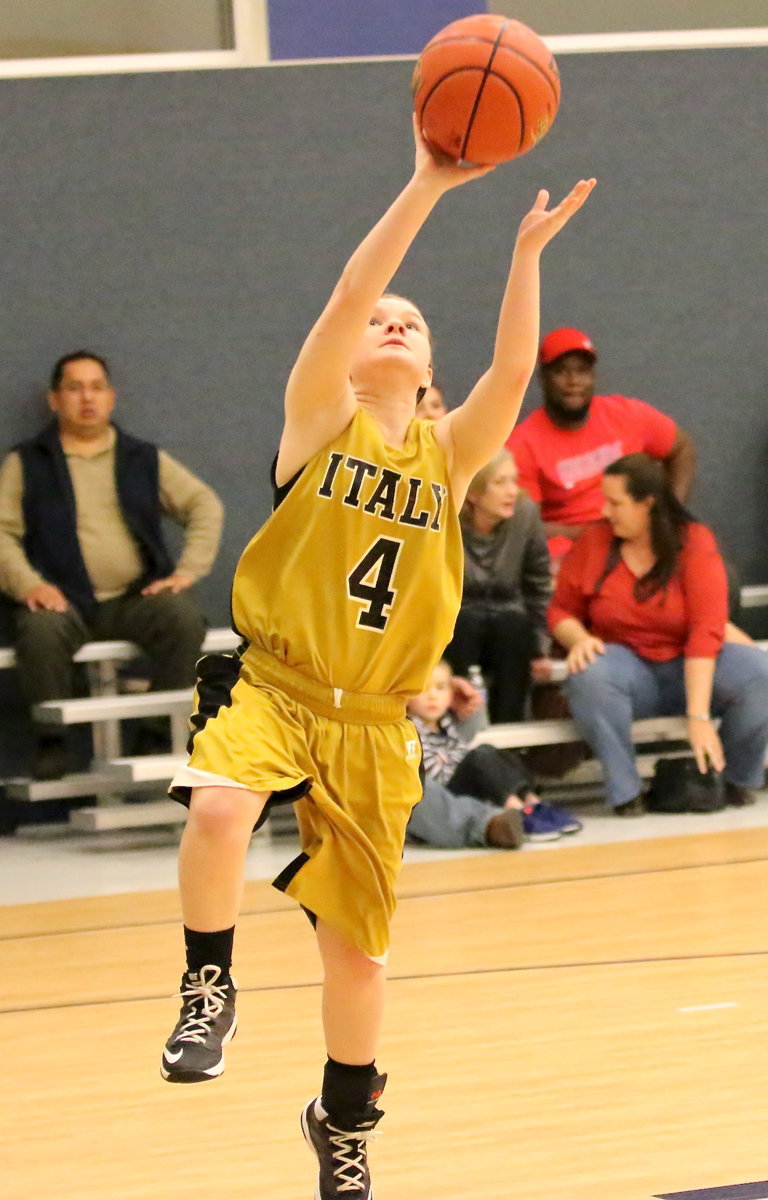 Image: Tara Wallis(4) helps seal Grand Prairie’s fate with a fast break basket.