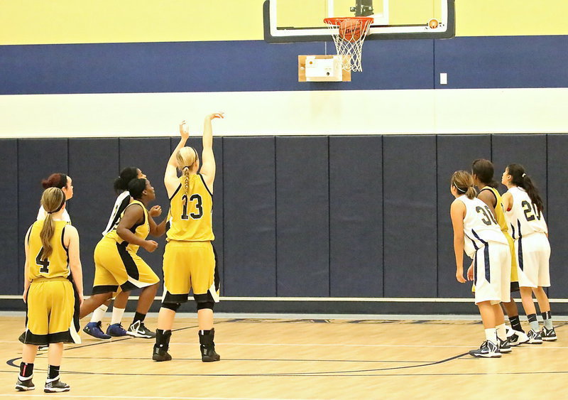 Image: Italy’s Jaclynn Lewis(13) goes 3-of-3 from the line against the Lady Eagles.