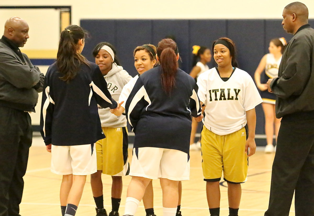 Image: Lady Gladiator senior captains Kendra Copeland, Ryisha Copeland and Bernice Hailey are welcomed by the Lady Eagle captains.