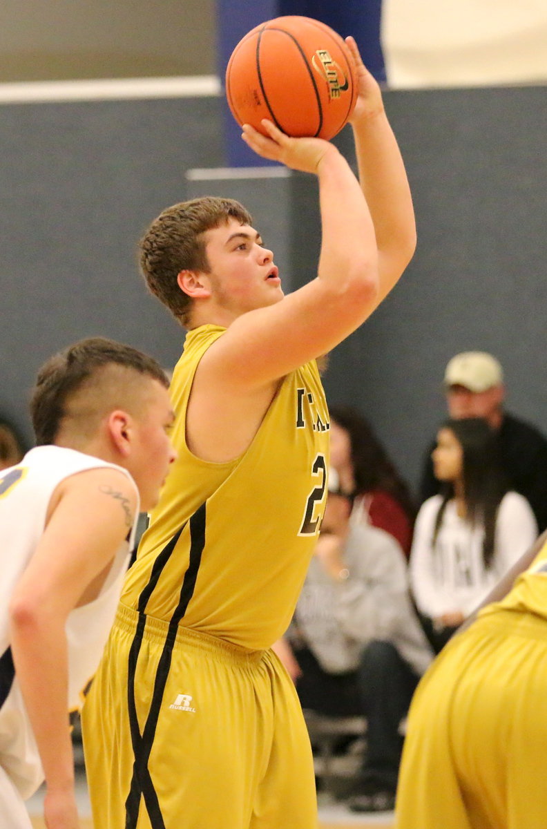 Image: Zain Byers(21) earns a trip to the foul line.