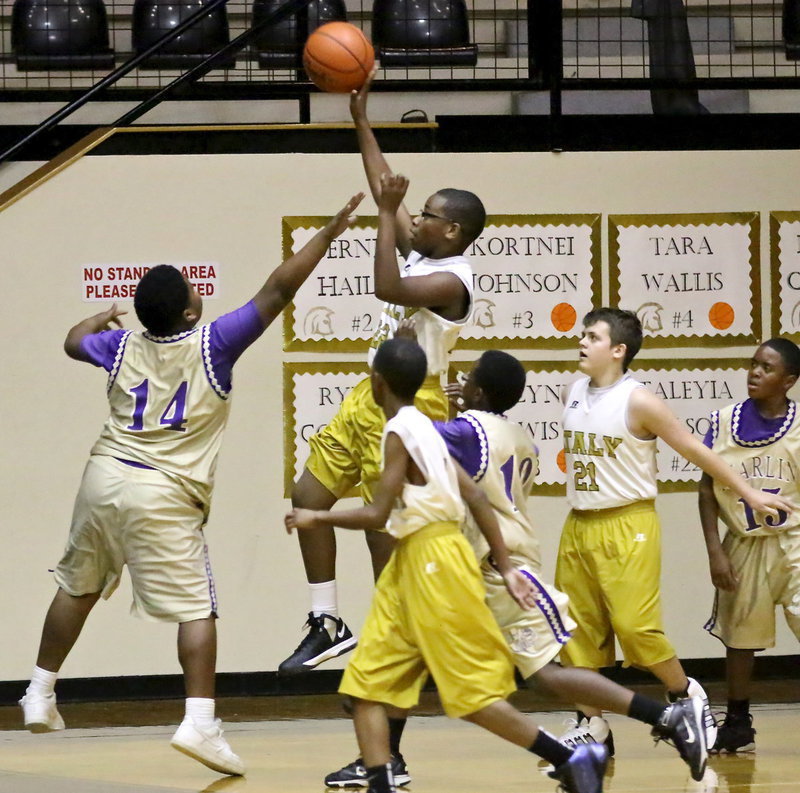 Image: Italy 7th grader Adam Powell(22) pulls up along the baseline to release the shot against Marlin.