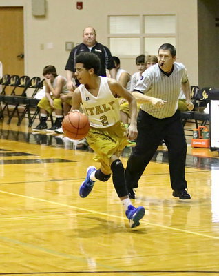 Image: Tylan Wallace(2) gets Italy’s offense rolling early to start the 8th grade matchup against Marlin.