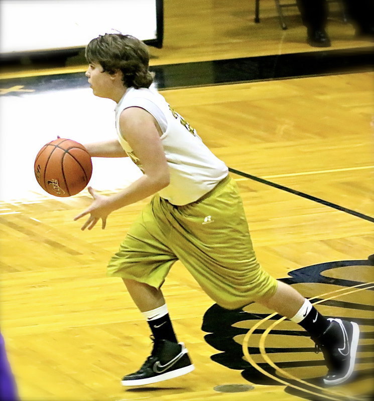 Image: Cade Roberts(20) dribbles the ball across mid-court for Italy.