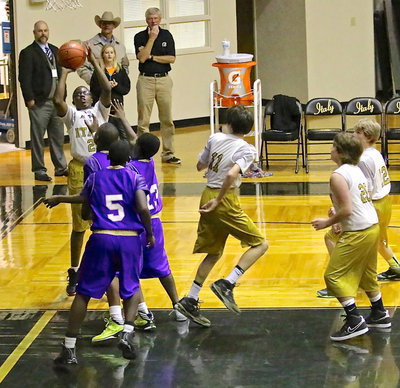 Image: Anthony Lusk, Jr.(23) scores from the low block.