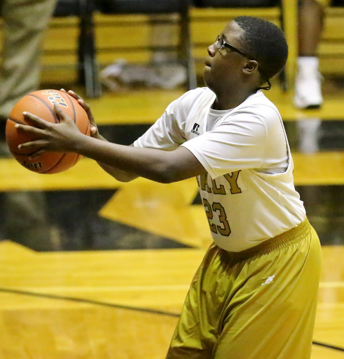 Image: Anthony Lusk, Jr.(23) takes a shot from the free-throw line.