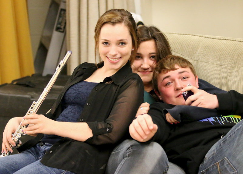 Image: Sarah, Alexis and Trevor are a proud group of Gladiator Regiment Band members.