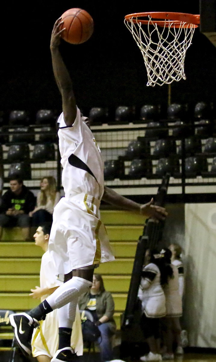 Image: Ding! Senior Gladiator TaMarcus Sheppard(10) answered the bell during the district dogfight against his old school, the Itasca Wampus Cats, to lead Italy with 23-points in their 68-59 victory.