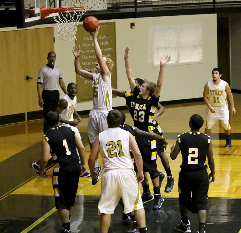 Image: Cody Boyd(15) scores down low for the Gladiators.