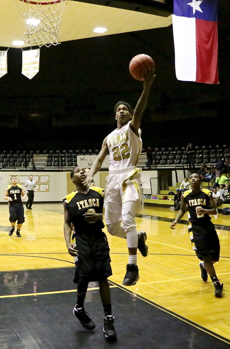 Image: Trevon Robertson(22) beats Itasca to the punch and capitalizes on the break.