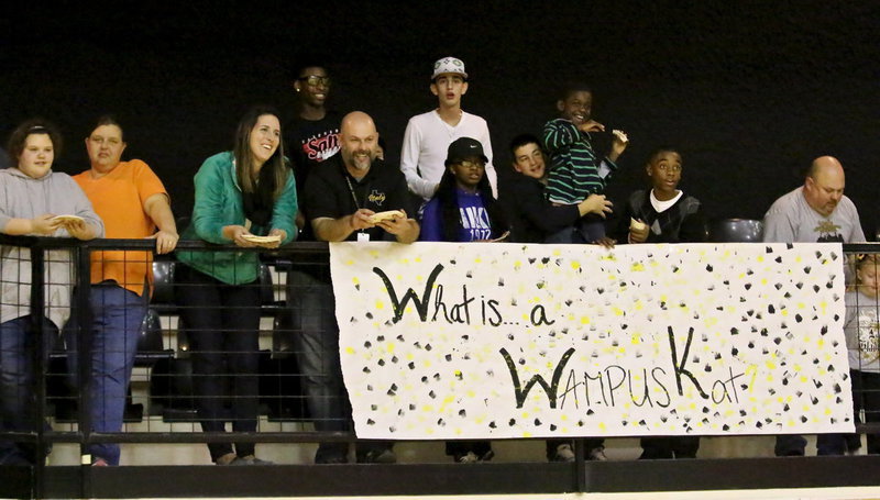 Image: Italy High School principal Lee Joffre joins fans in preparation for the tortilla toss at halftime which raised money for the Lady Gladiator Softball team.