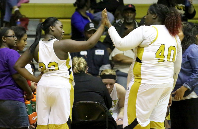 Image: Teammates Taleyia Wilson(22) and Cory Chance(40) are proud of their accomplishments knowing they have Itasca ready to retreat.