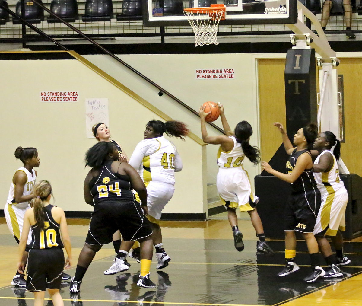 Image: Lady Gladiator, Kendra Copeland(10) pulls down a rebound.