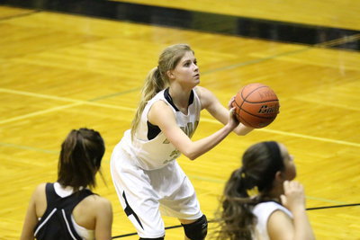 Image: Halee Turner(5) is focused at the line and makes 2-out of-4 on her way to a 6-point game.