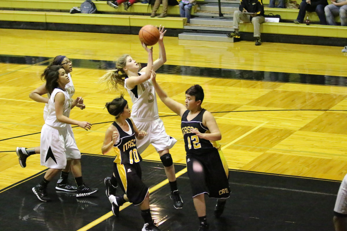 Image: Halee Turner(5) pulls for the mini jumper off the fast break.