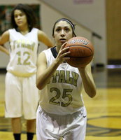 Image: Lizzie Garcia(15) splits a pair of free-throws and scores 3-points total against Itasca.