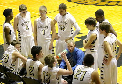 Image: JV Gladiator coach Jon Cady guides his squad with enthusiasm in the closing minutes.