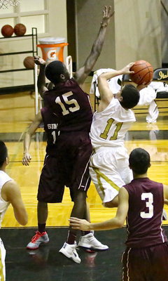 Image: Senior guard, Tyler Anderson(11) craftily scores a bucket for the Gladiators.