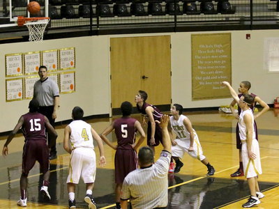 Image: Gladiator, Ryan Connor(1) takes a turn from the free-throw line.