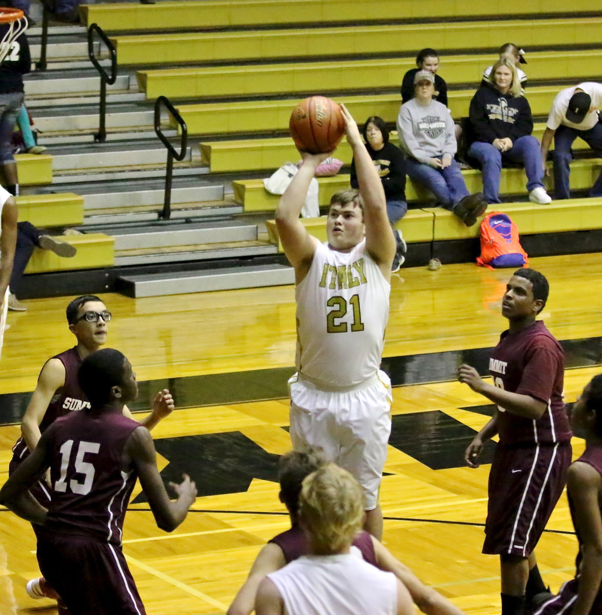 Image: Zain Byers(21) drops in a soft shot for 2 of his 5-points against the SkyHawks.