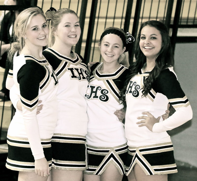 Image: Italy High School cheerleaders Kelsey Nelson, Taylor Turner, Britney Chambers and Ashlyn Jacinto cheese it up for the camera.