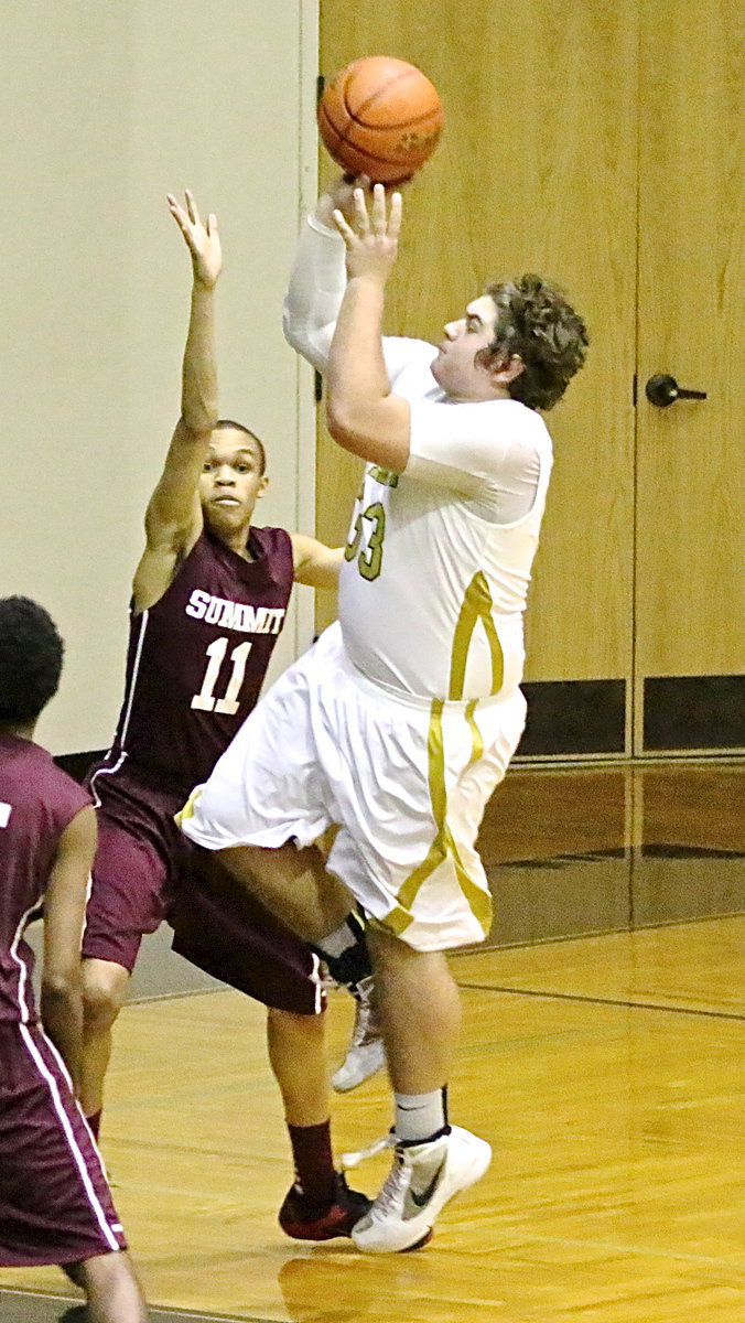 Image: A SkyHawk defender is forced to deal with the flying Kevin Roldan(33).