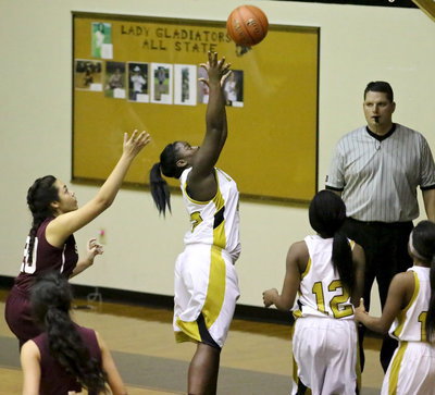 Image: Lady Gladiator, Taleyia Wilson(22) secures a rebound for her team.