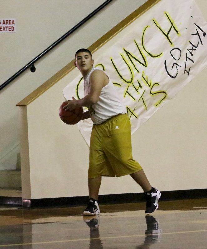 Image: Italy 7th Grader, Alex Garcia(44) inbounds the ball.