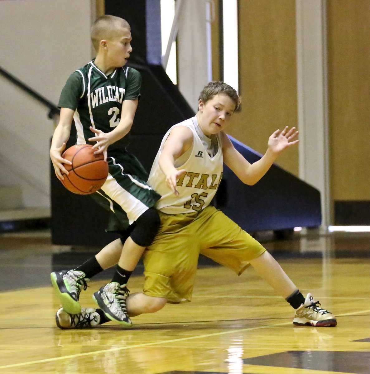 Image: Italy 7th Grader, Cade Brewer(15) plays tenaciously on defense.