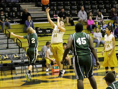 Image: Alex Garcia(44) launches a long shot during Italy’s 7th grade game against Scurry.