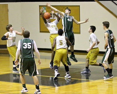 Image: Italy 8th grader, Anthony Lusk, Jr.(23) battles for a board.