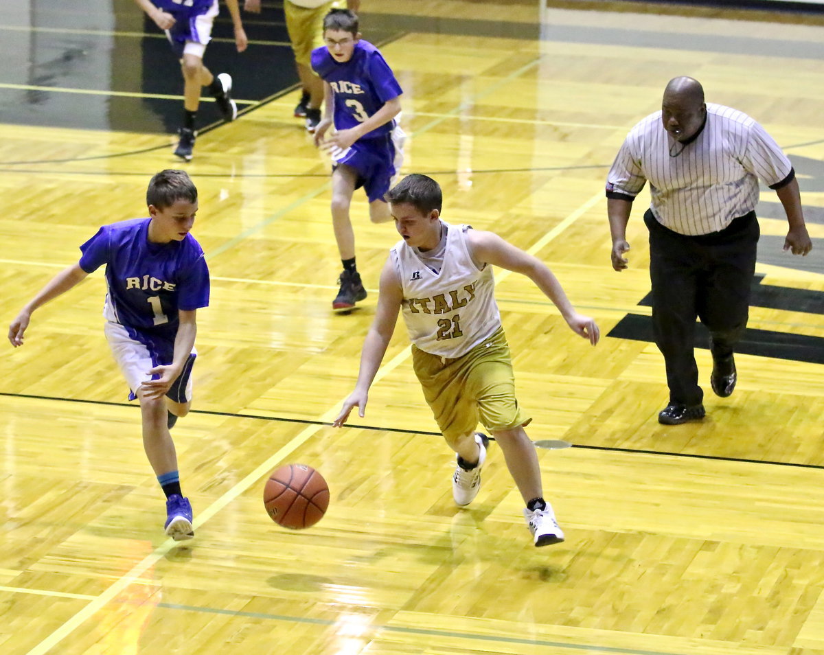 Image: Cason Roberts(21) steals the ball away from Rice.