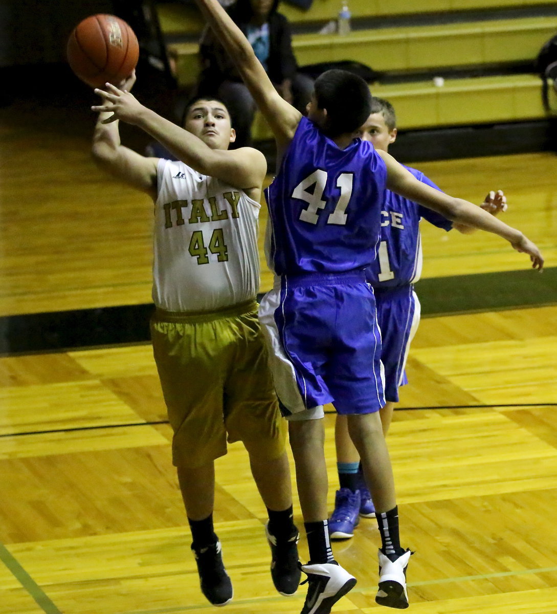 Image: Alex Garcia(44) maneuvers to get up a shot along the baseline.