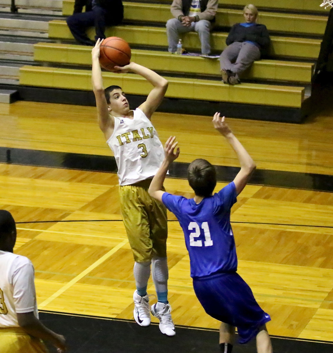 Image: Gary Escamilla(3) pulls up for a jumper.