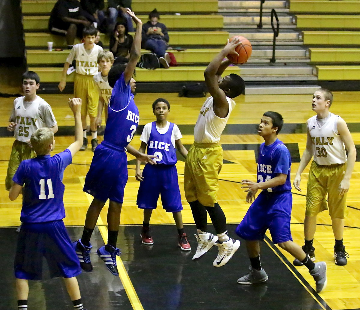 Image: Rising up to take the shot is Kendrick Norwood(5).