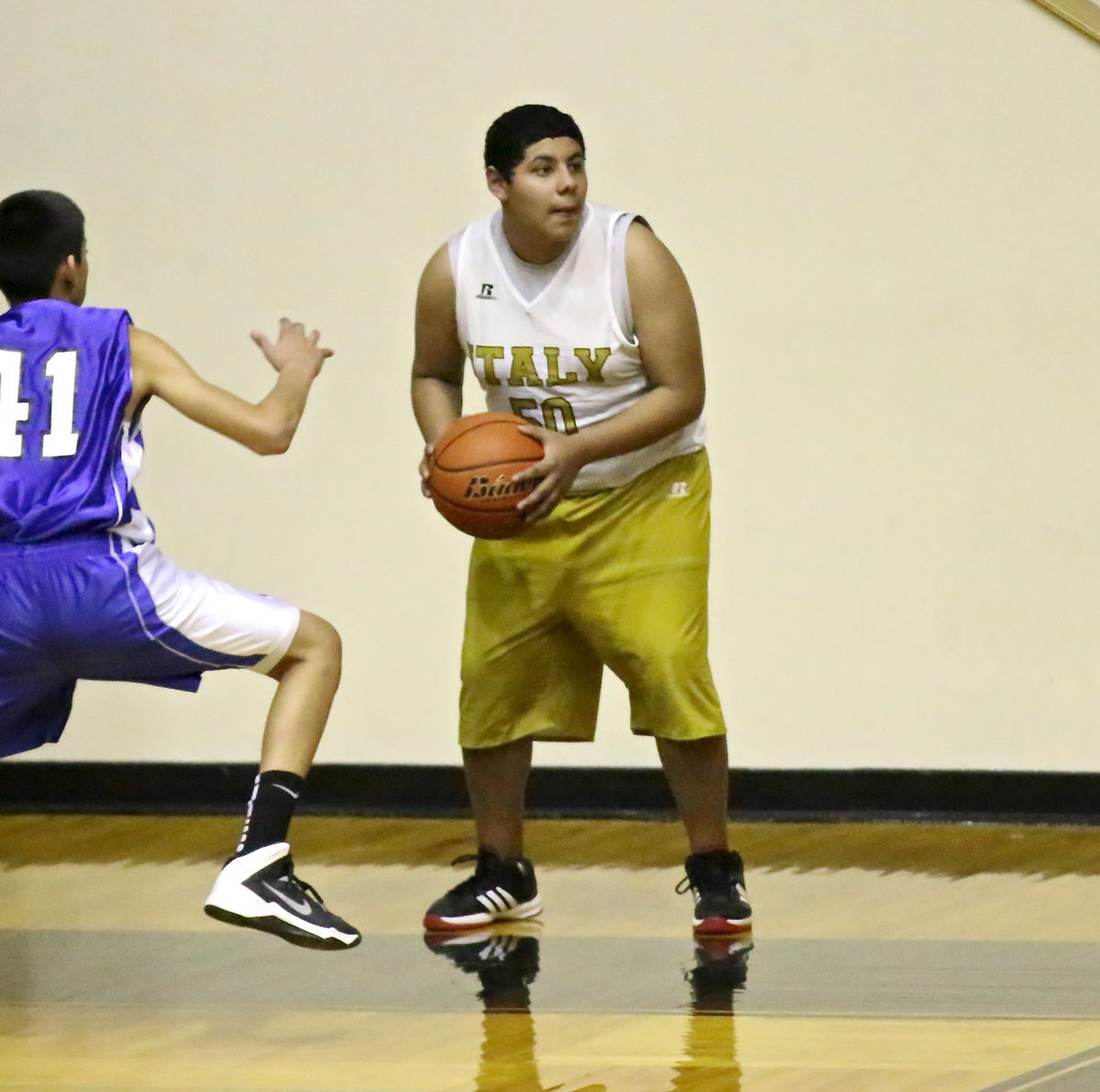 Image: Mario Rodriguez(50) looks for an open teammate.