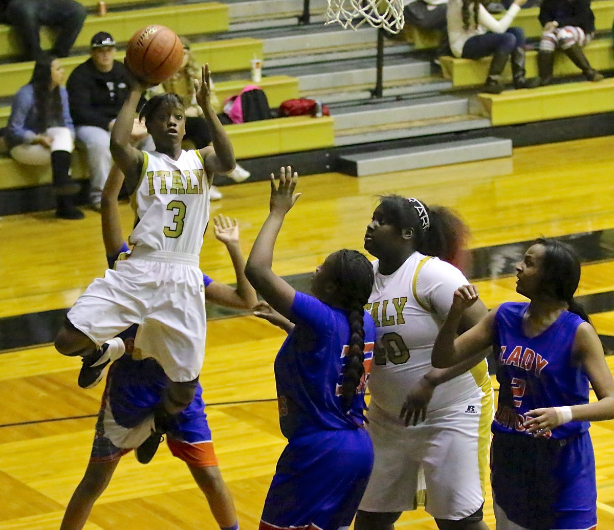 Image: Lady Gladiator, Kortnei Johnson(3) gets her kicks with 17-points against Gateway.