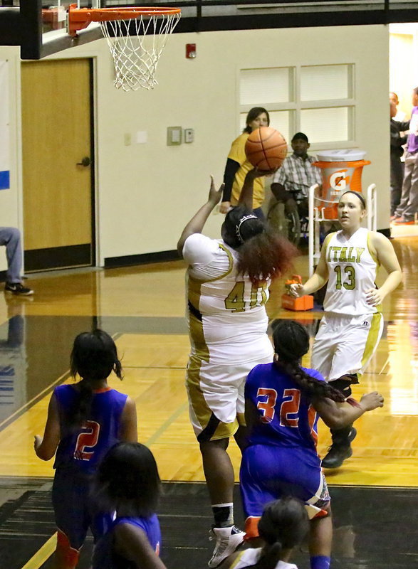 Image: Cory Chance(40) turns and scores in front of the rim.