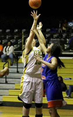 Image: Lady Gladiator, Jaclynn Lewis(13) banks in 2-of her 4-points off the glass.
