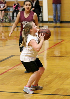 Image: Haley Mathers(5) takes advantage of an open look at the basket.