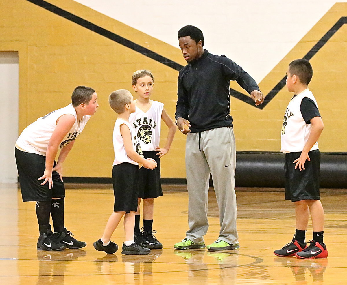 Image: Head coach and one of Italy’s greats, Jasenio Anderson passes on his passion for competition to some future Gladiator greats.