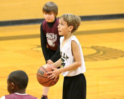 Image: Chase Hyles(11) is zoned in at the free-throw line.