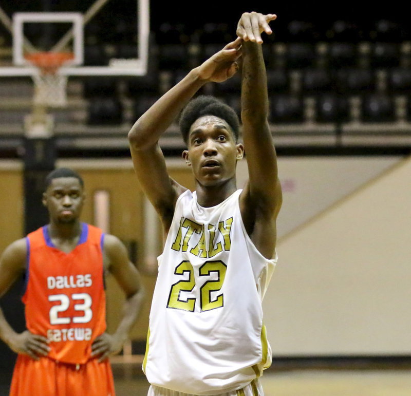 Image: With little else working against the Gators, Trevon Robertson(22) generates offense from the free-throw line for the Gladiators. Robertson went 11-of-16 from the line, dropped in four 3-pointers and scored a total of 31-points.