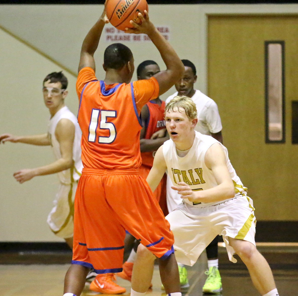 Image: Italy post player, Cody Boyd(15) closes out on a Gateway ball handler.