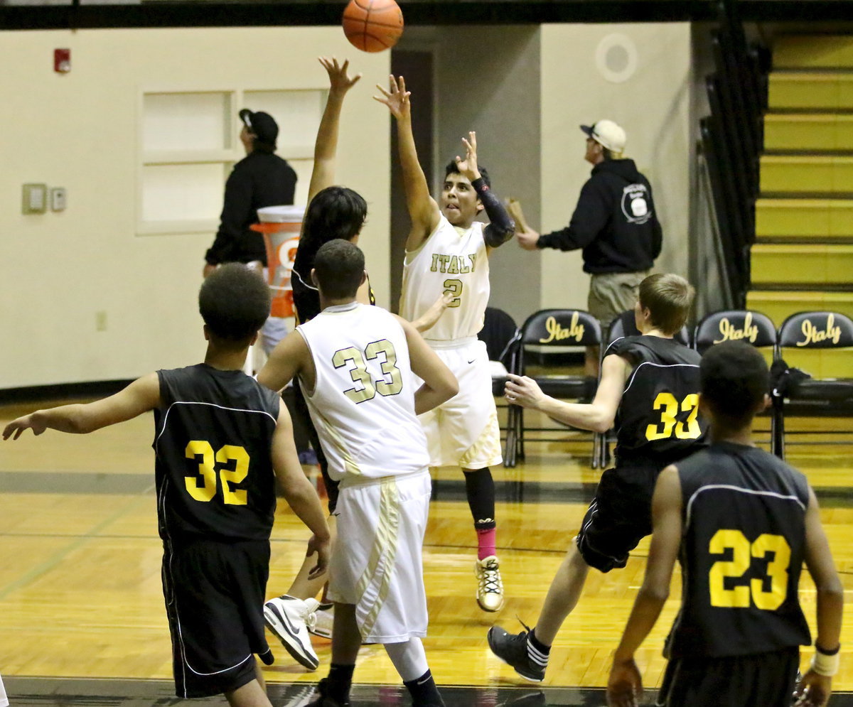 Image: Jorge Galvan(2) confidently let’s the shot fly over Itasca’s defense.